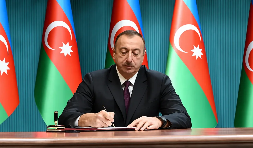 President Ilham Aliyev signs an order honouring energy workers